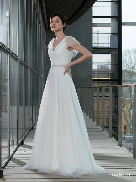 Quel style de robe de mariée doit-on choisir quand on a du ventre proche de Libourne en Gironde ?